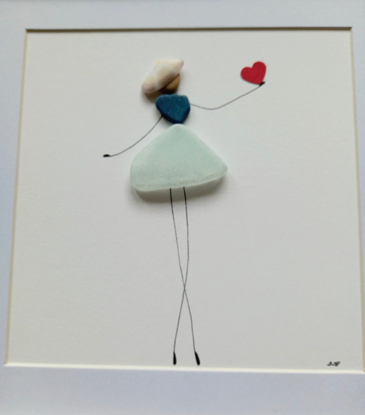 Quadro in vetro di mare donna col cuore rosso, 22x22 cm, vista laterale