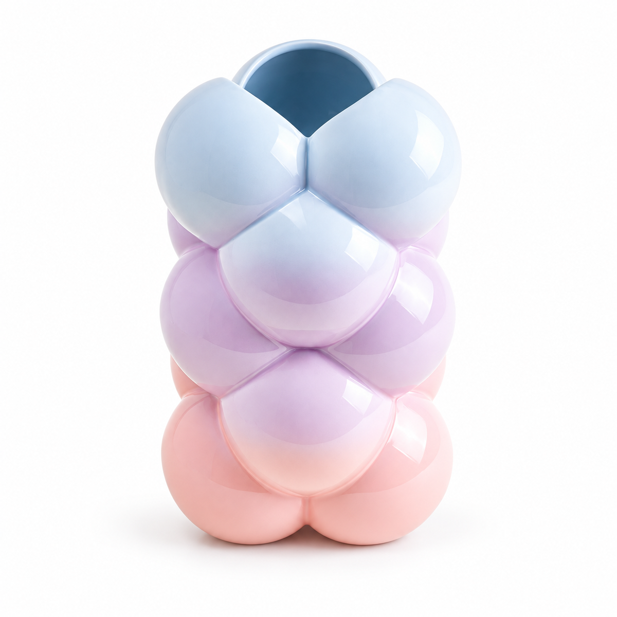 Vaso MAM Motel a Miio x Patrick Vogel in terracotta, con forme intrecciate nei colori blu, viola e rosa, su fondo bianco.