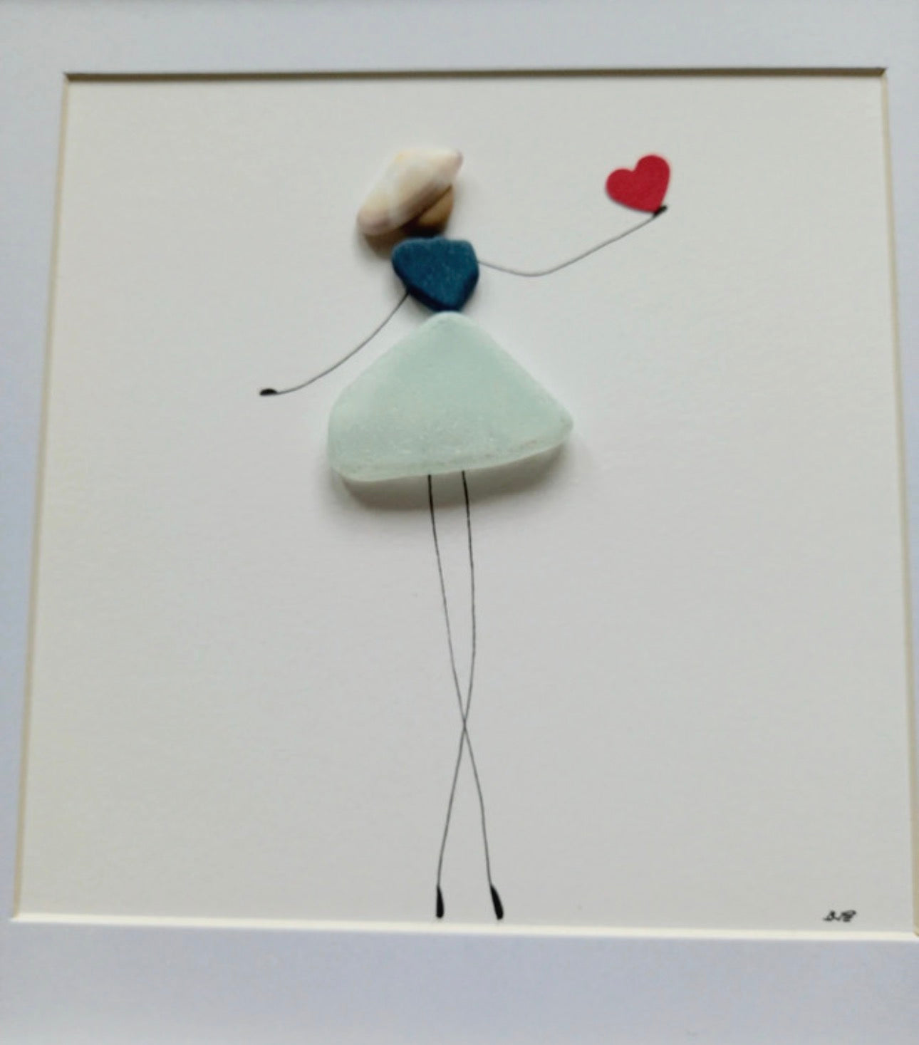 Quadro in vetro di mare donna col cuore rosso, 22x22 cm, vista laterale
