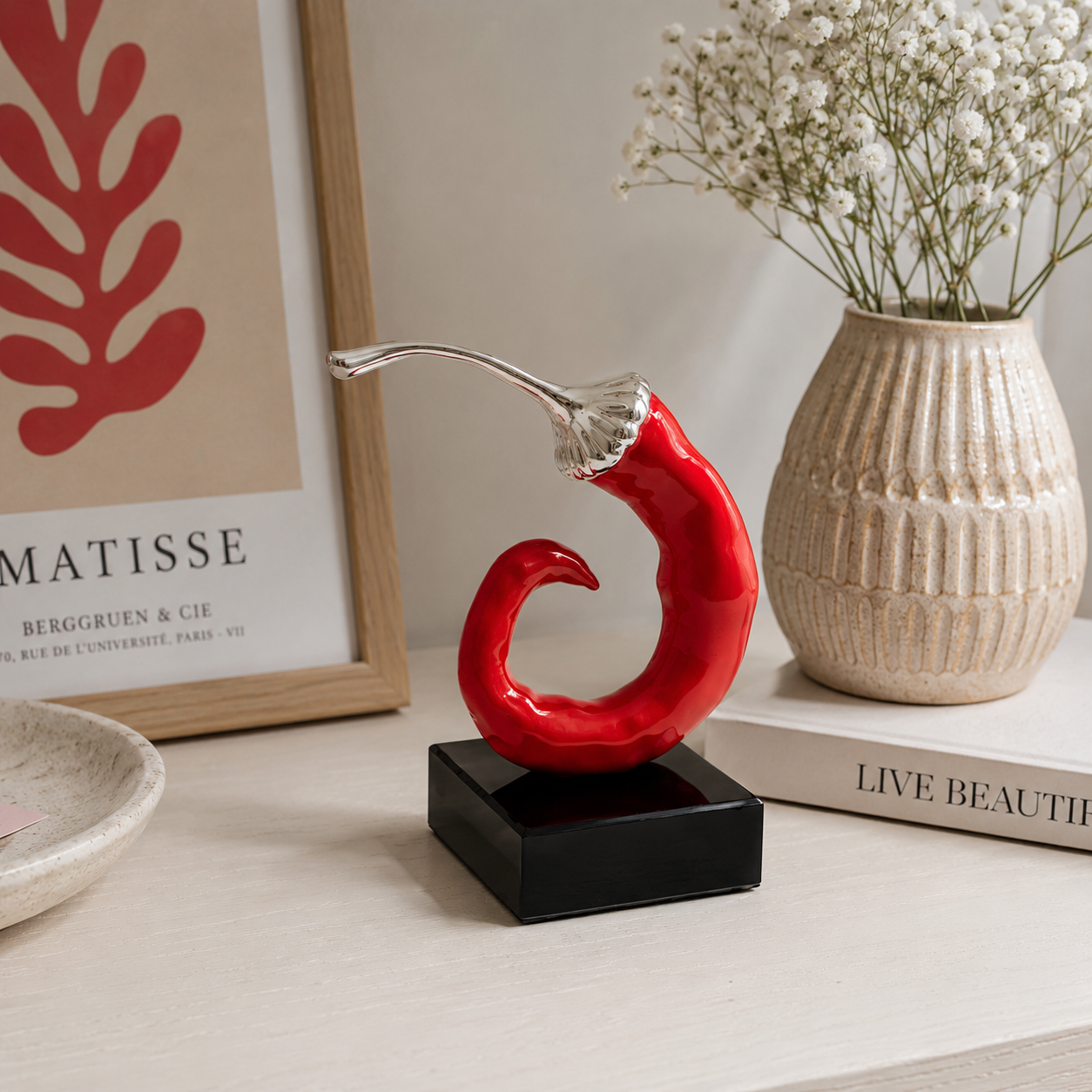 Scultura Peperoncino rosso e argento Sequenze, dettaglio