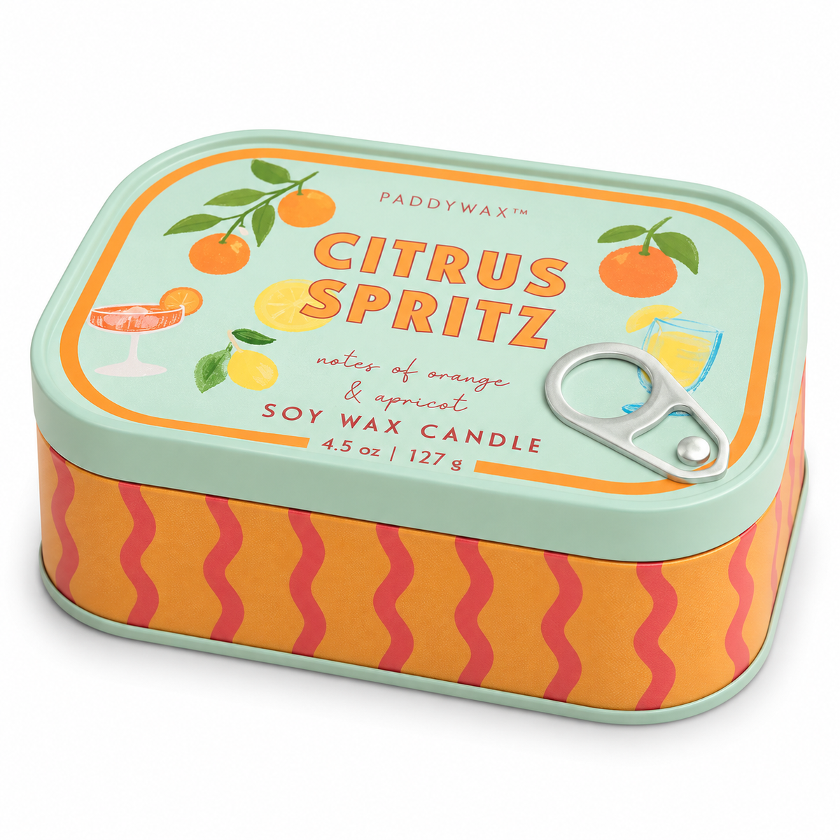 Candela Paddywax Citrus Spritz da 127 g in lattina arancione con onde rosa, coperchio verde acqua e illustrazioni di agrumi, su fondo bianco.